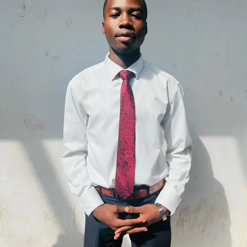 MBELLA FILS JUNIOR ROSTAND