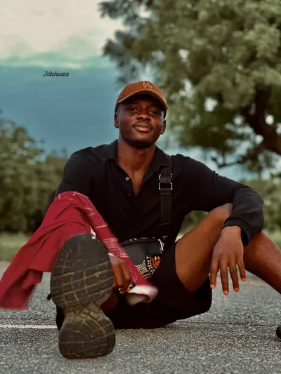 JOHN TCHIAZE